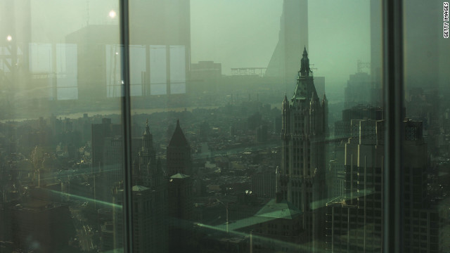 New York City is seen through a window of Four World Trade Center on Friday.